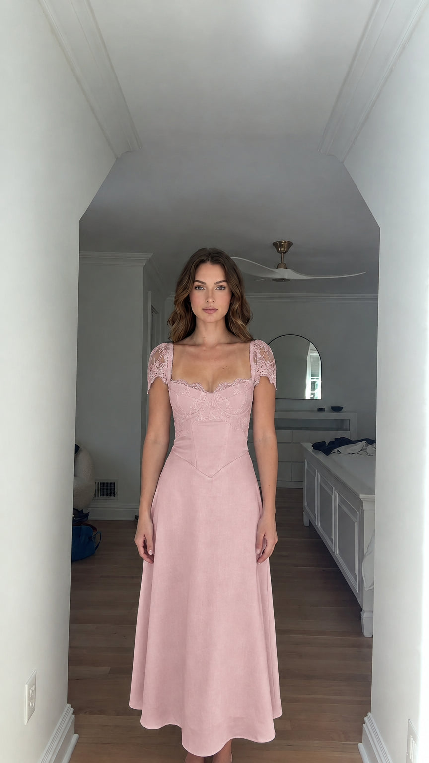 Model wearing dusty rose pink lace trim corset maxi dress