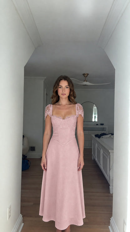 Model wearing dusty rose pink lace trim corset maxi dress