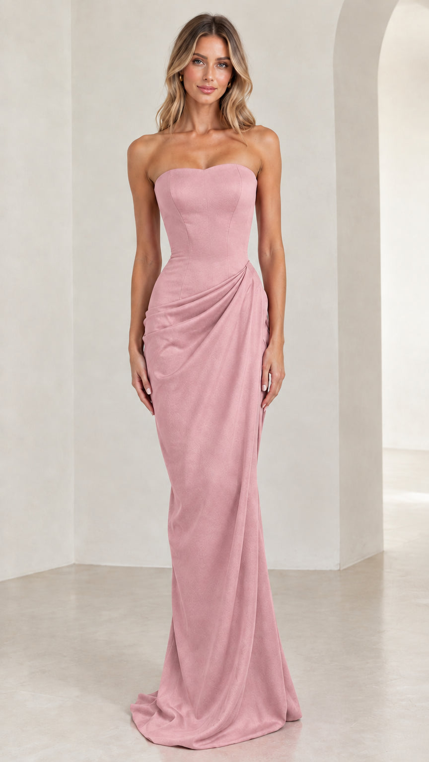 Model wearing dusty pink strapless sweetheart column evening gown