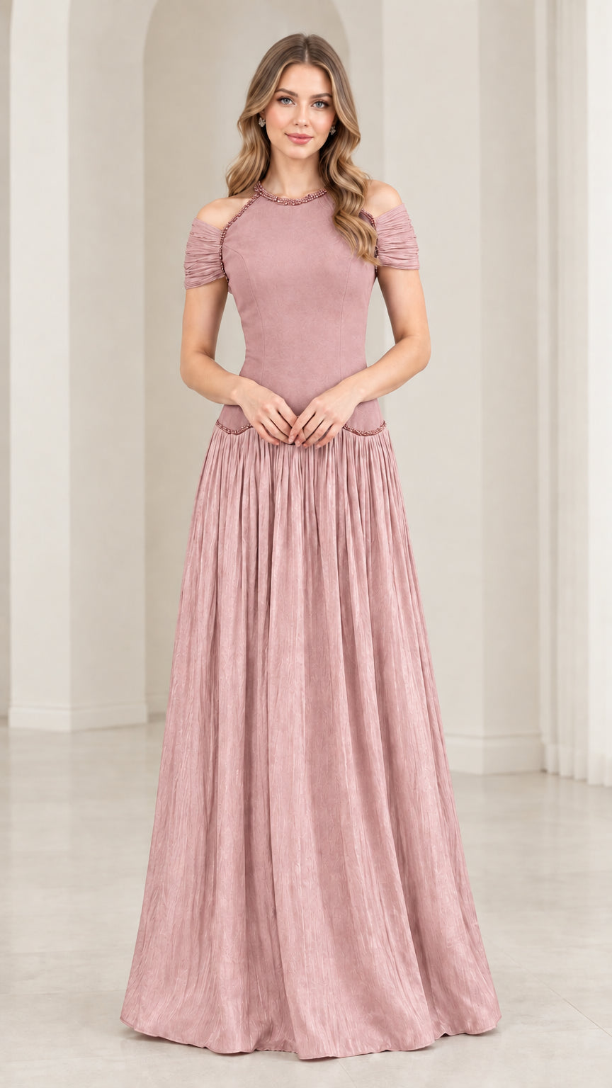 Woman wearing dusty rose cold shoulder beaded pleated maxi dress