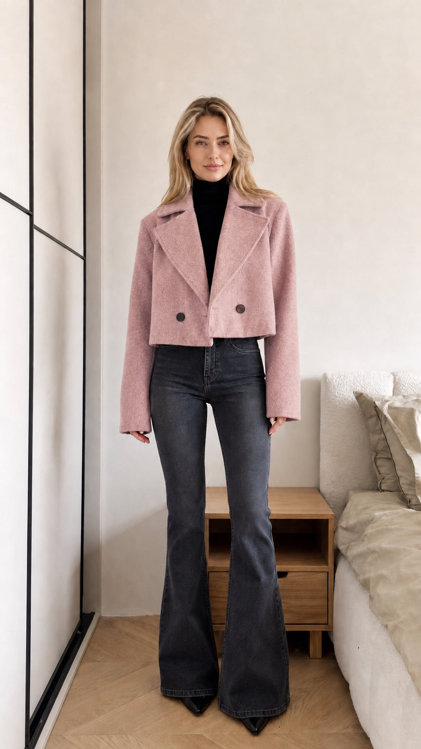 Model wearing dusty pink cropped double-breasted tailored jacket