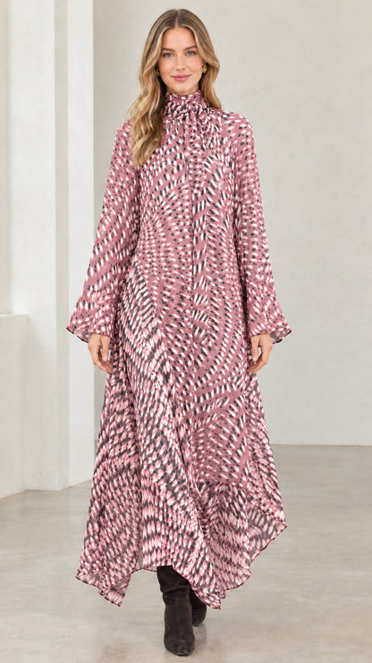 Model wearing dusty pink abstract print high neck flowy maxi dress