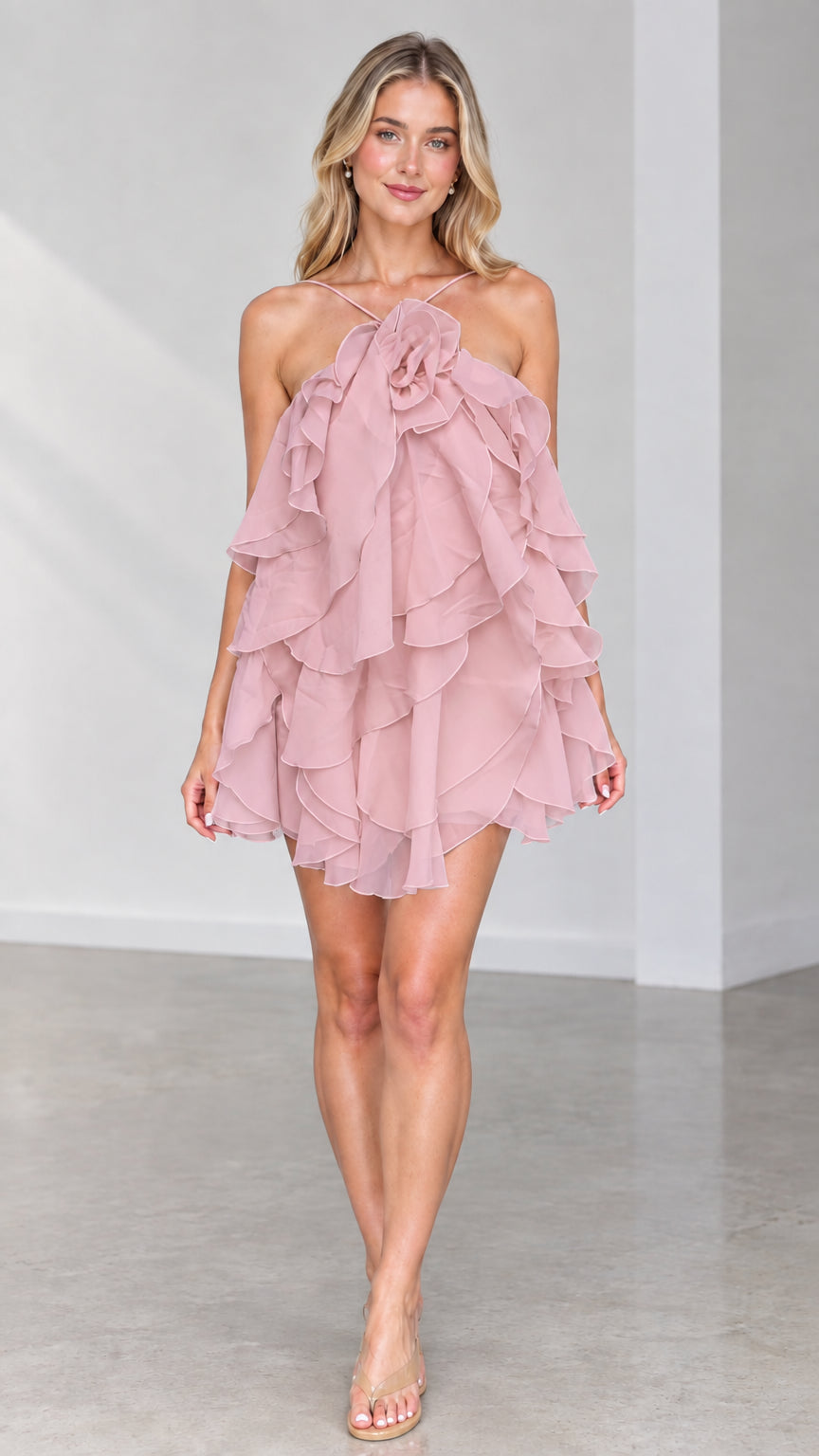 Front view of model wearing Dusty Pink tiered ruffle halter mini dress