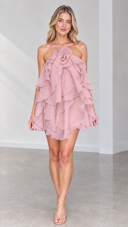 Front view of model wearing Dusty Pink tiered ruffle halter mini dress