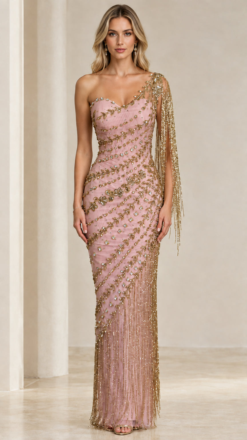 Front view of model wearing Blush Pink and gold one-shoulder beaded fringe evening gown