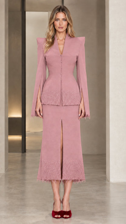 Front view of model wearing the dusty pink sculpted blazer and midi skirt set