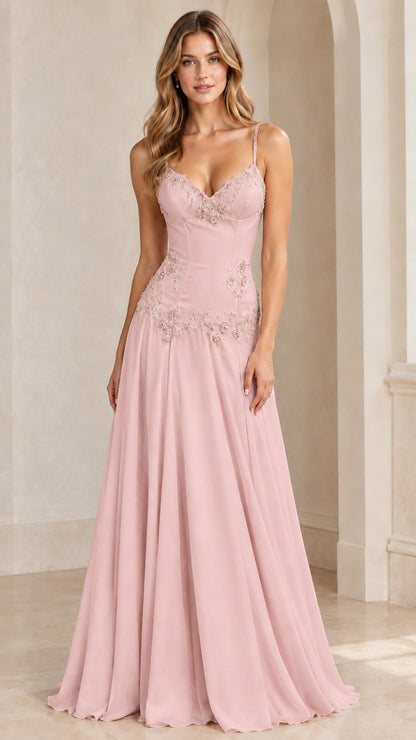 Model wearing blush pink sweetheart neck formal evening gown with tonal embroidery