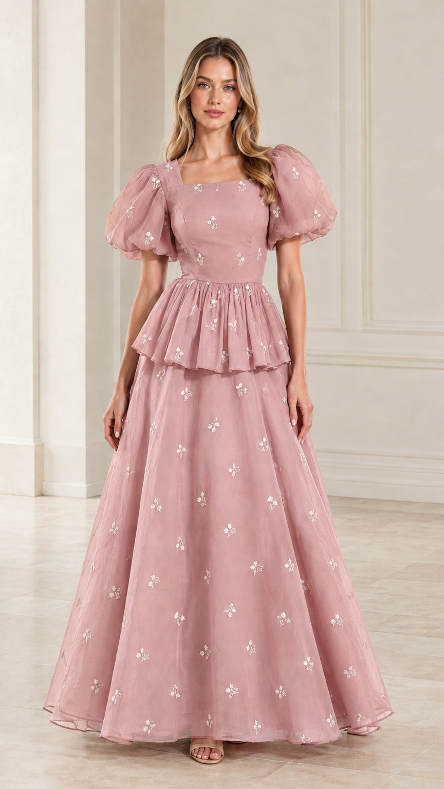 Full-length view of woman wearing dusty pink embroidered puff sleeve evening dress