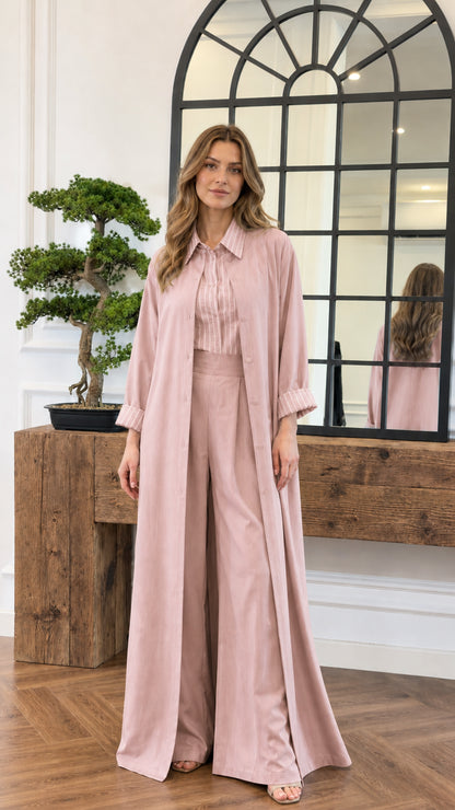 Model wearing the dusty pink 3-piece modest duster and trouser set