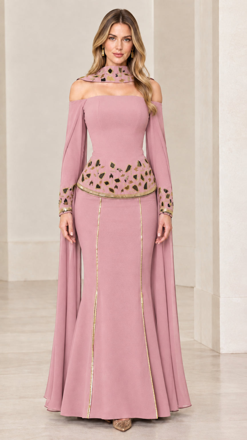 Dusty pink cold-shoulder mermaid evening gown with gold embroidery and cape sleeves