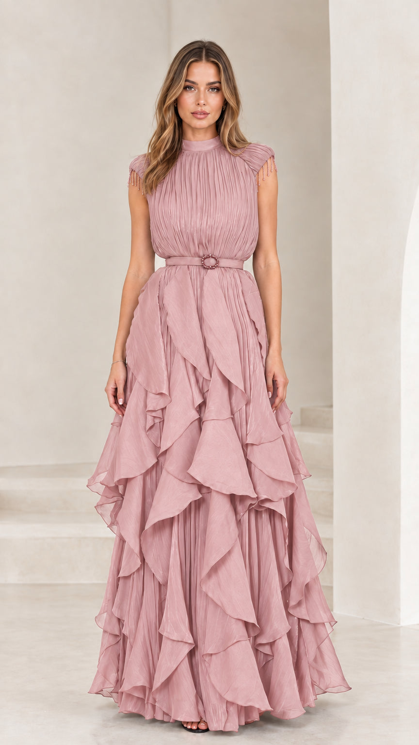 Front view of dusty pink pleated tiered ruffle evening gown