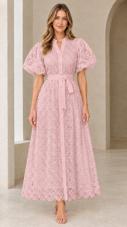 Front view of model wearing blush pink embroidered lace puff sleeve maxi dress