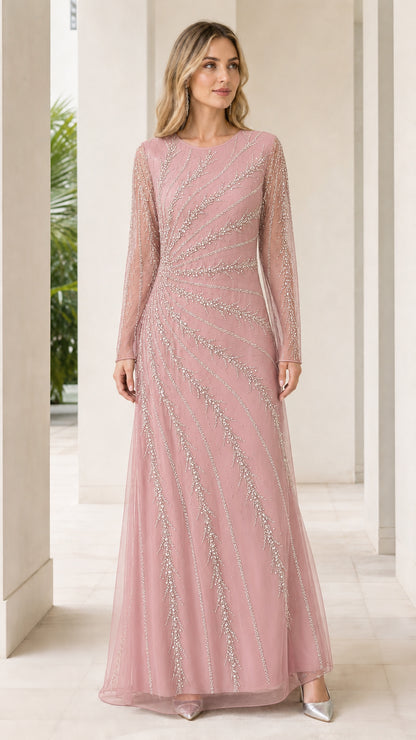 Woman wearing dusty pink embellished long sleeve formal gown