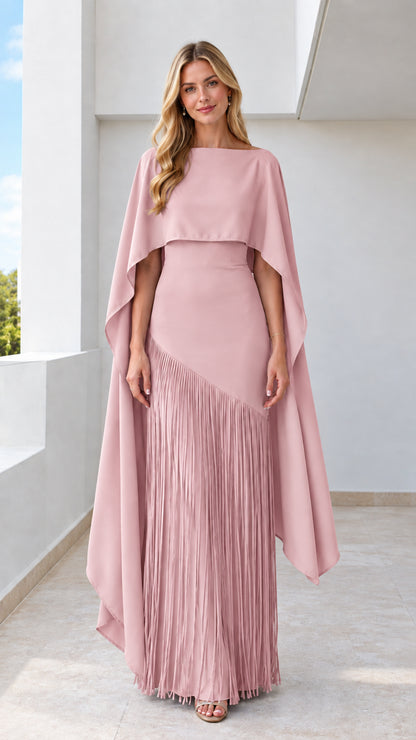 Dusty pink floor-length evening gown with draped cape overlay and fringe skirt