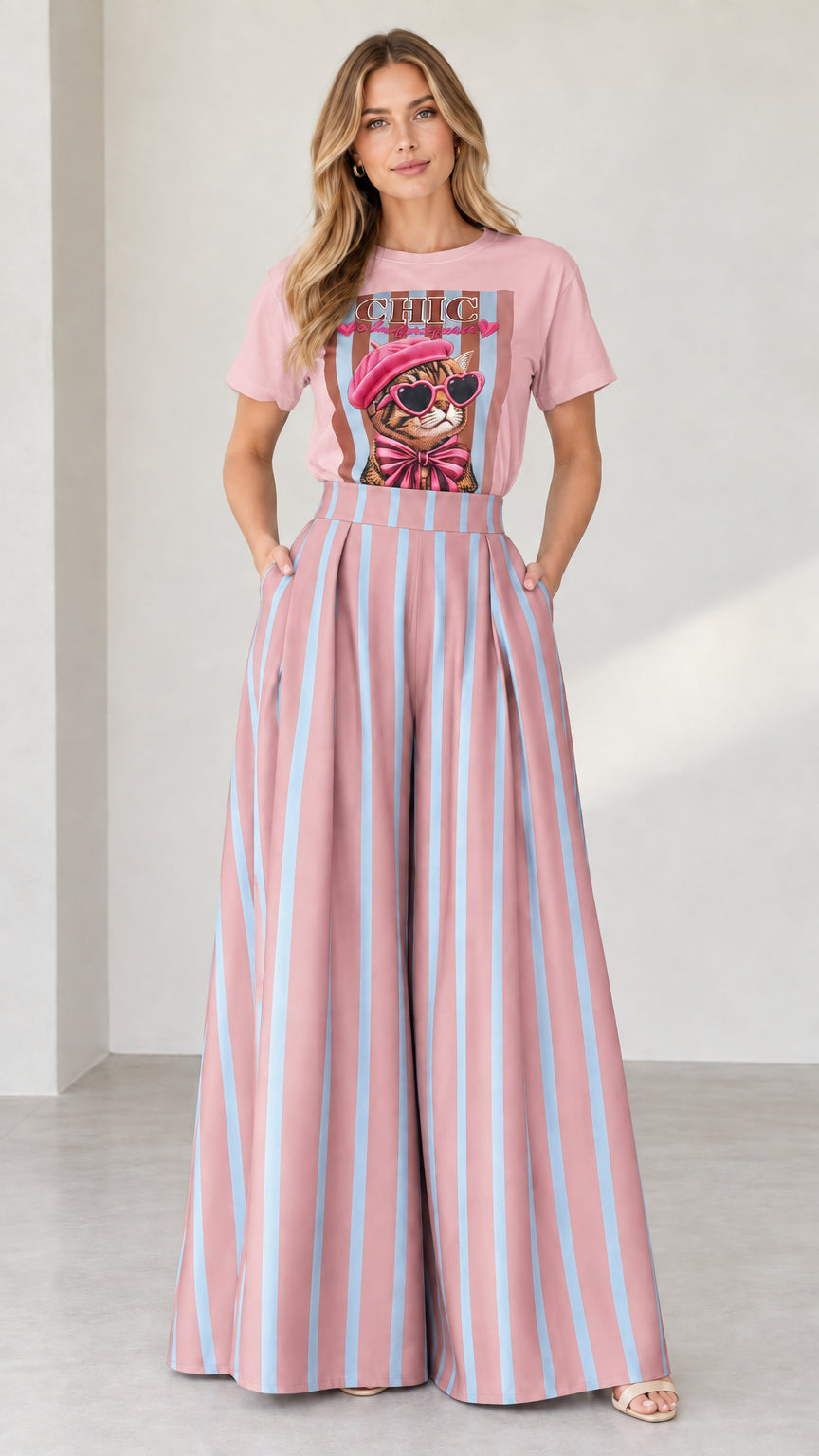 Full-length shot of dusty pink graphic tee and pink striped wide-leg pants set