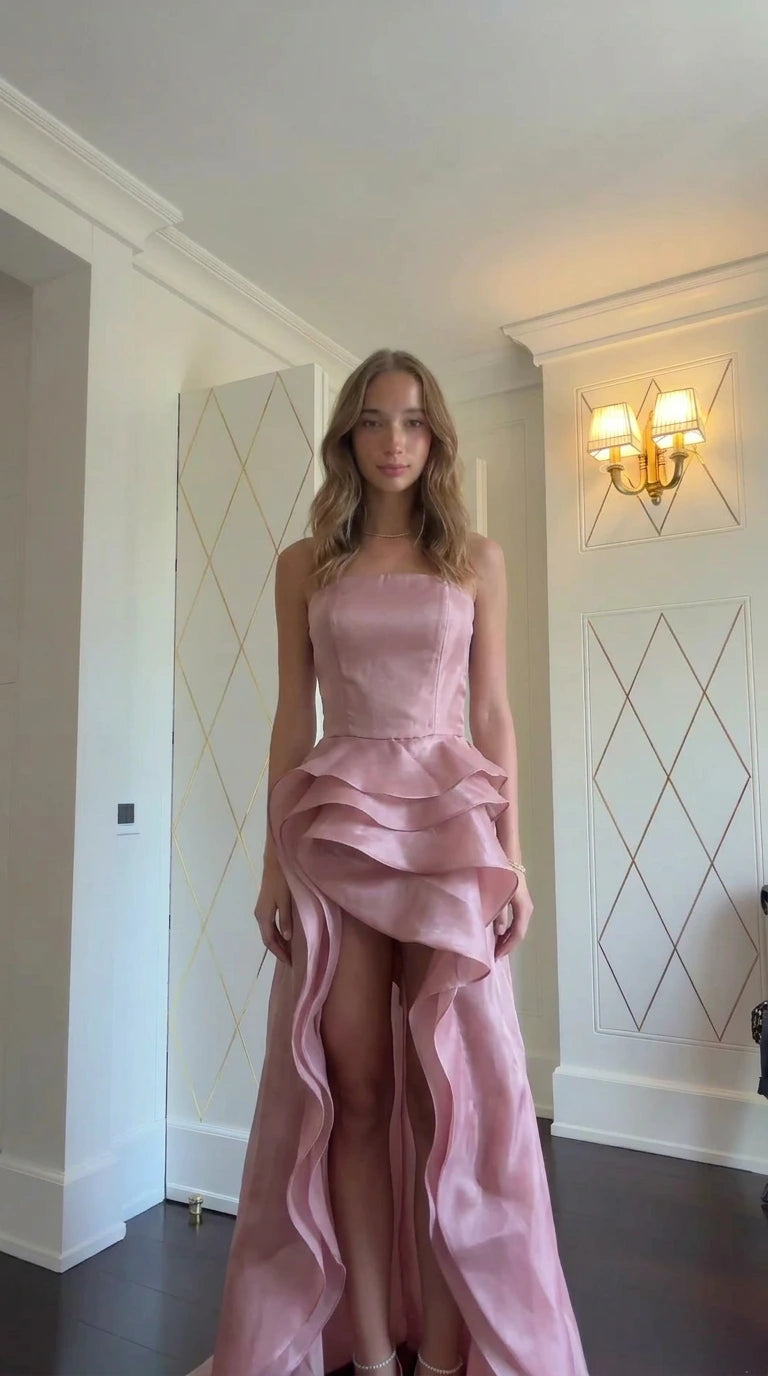 Model wearing Dusty Pink strapless tiered ruffle evening maxi dress