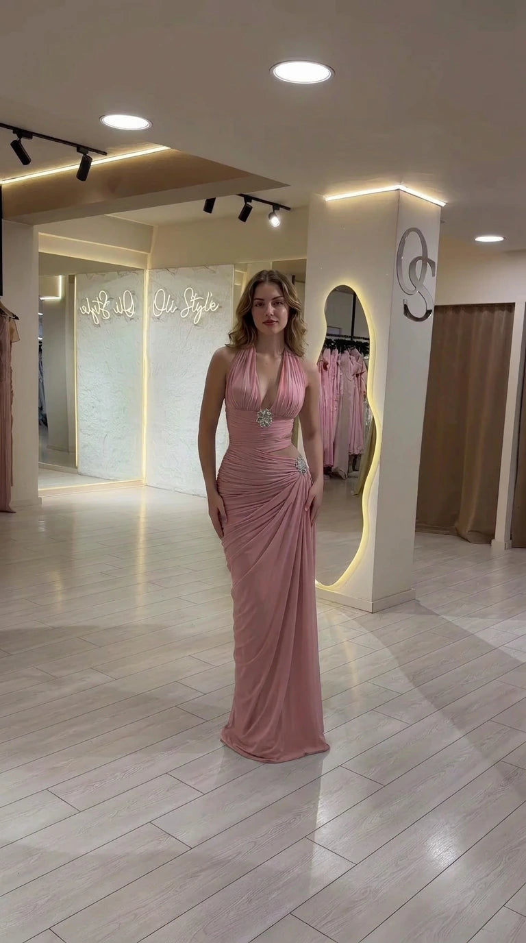 Front view of model wearing Dusty Rose halter ruched formal gown