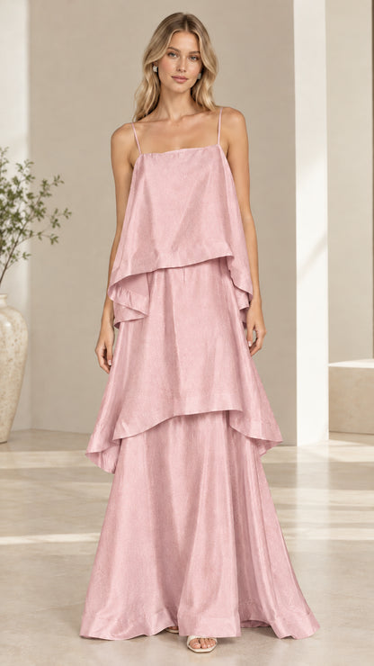 Model wearing blush pink tiered cami maxi dress front view