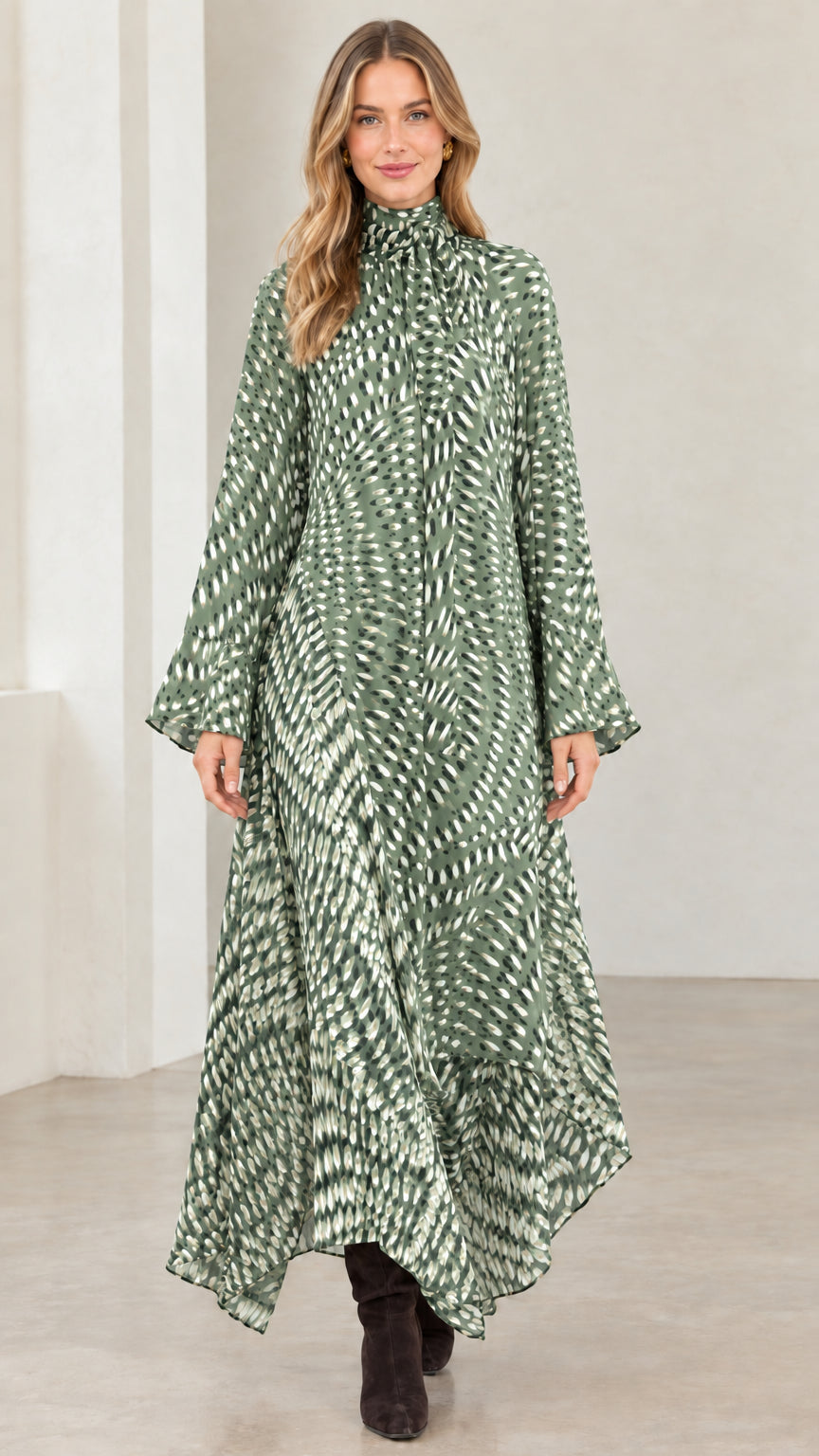 Model wearing sage green abstract print asymmetrical long sleeve maxi dress