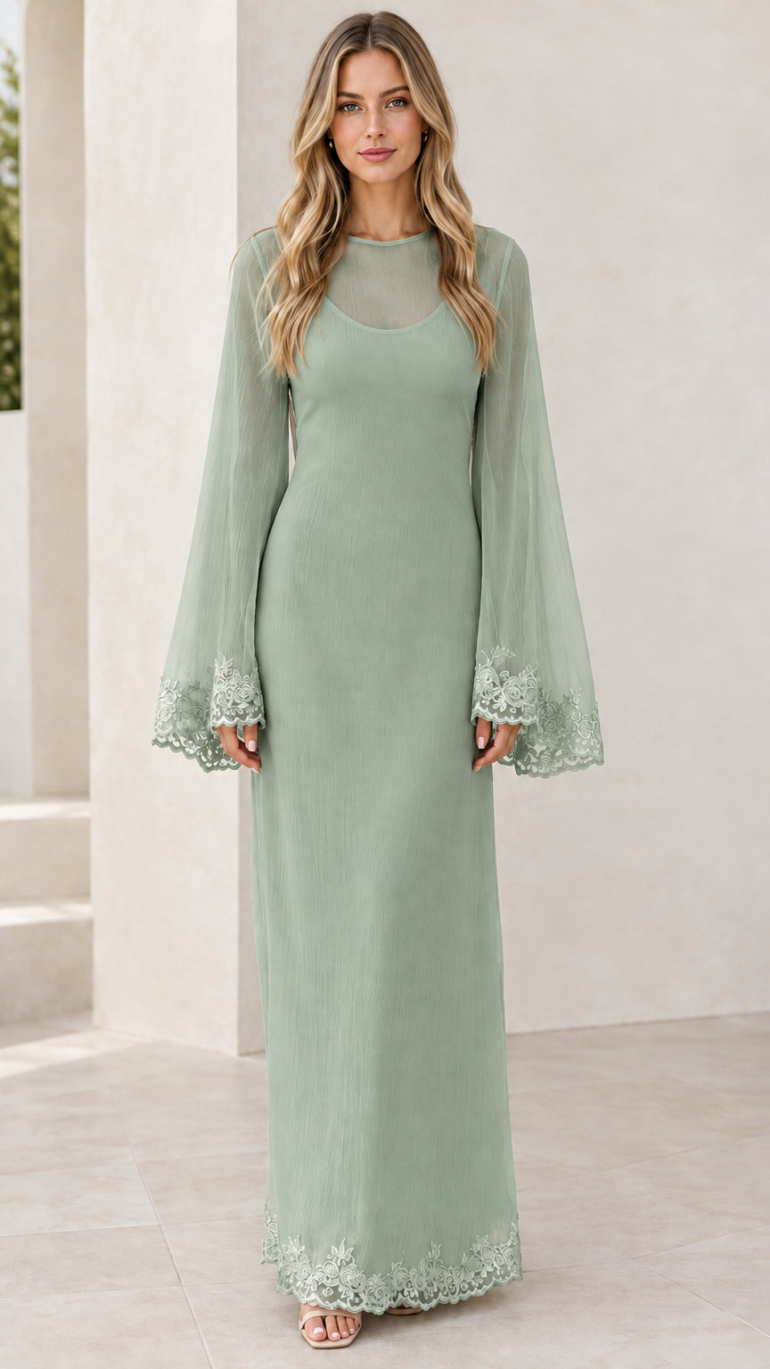 Front view of sage green flared sleeve maxi dress with lace trim