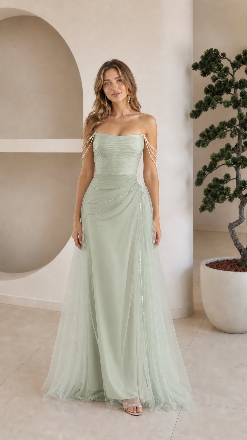 Front view of model in sage green strapless beaded tulle formal dress