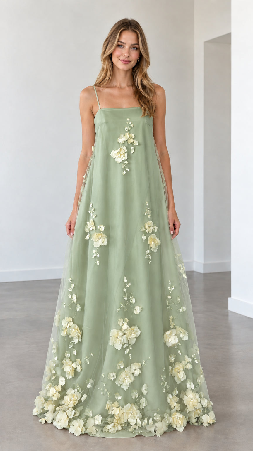 Model wearing sage green 3D floral applique spaghetti strap maxi dress