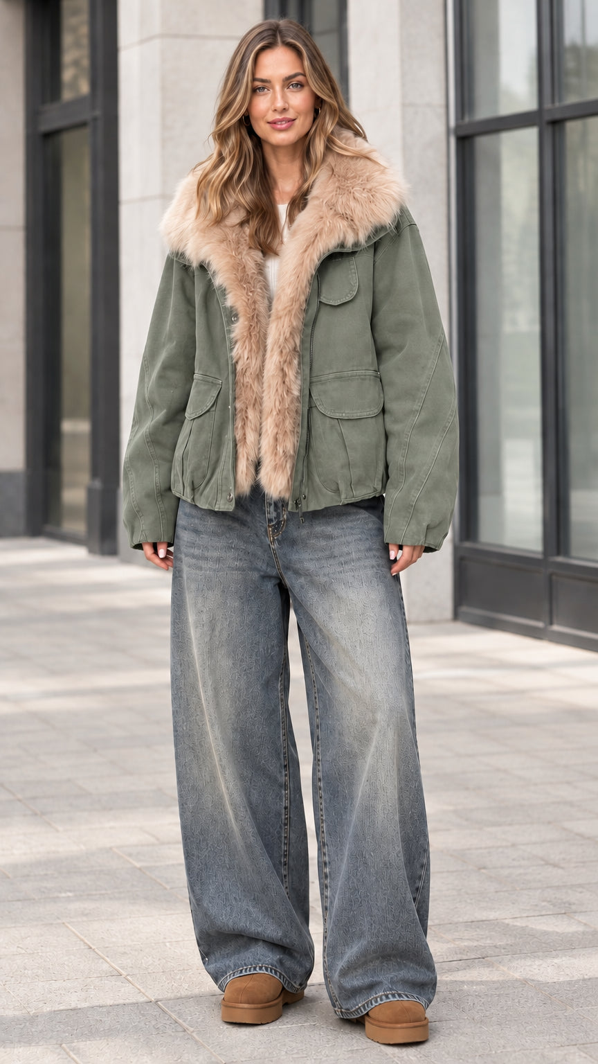 Full front view of model wearing sage green faux fur trim winter jacket