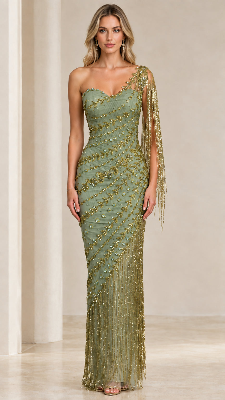 Front view of model wearing Sage Green and gold one-shoulder beaded fringe evening gown