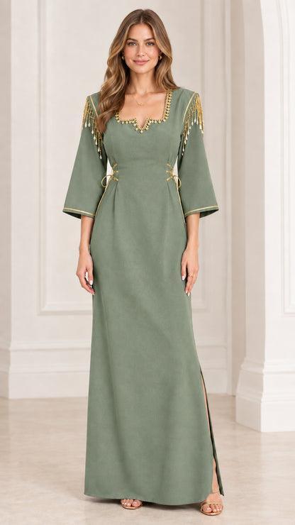 Full-length view of sage green maxi dress with gold embellishments and flared sleeves