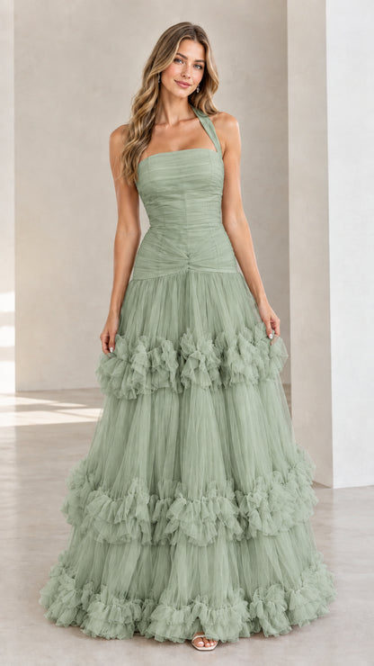 Front view of woman wearing Sage Green halter neck tiered tulle ruffle gown
