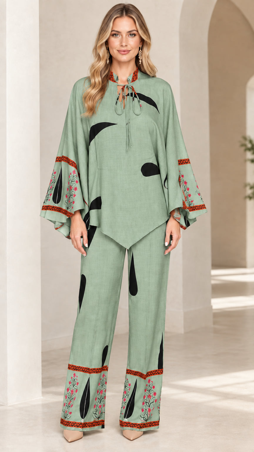 Front view of women's sage green printed tunic and wide-leg pants set
