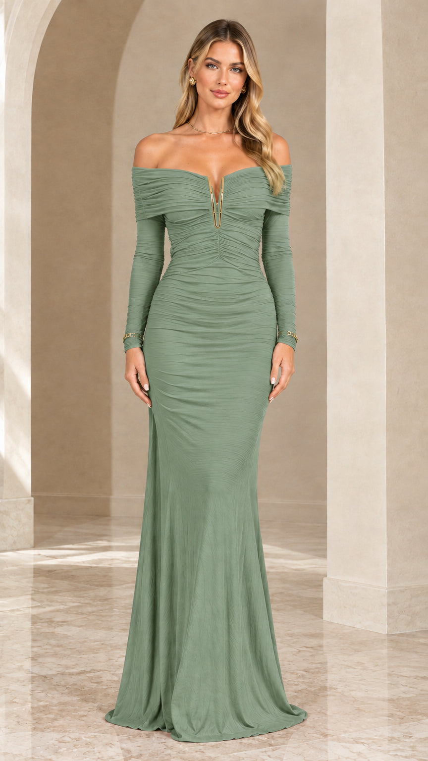 Model wearing long sleeve off-the-shoulder sage green floor-length gown