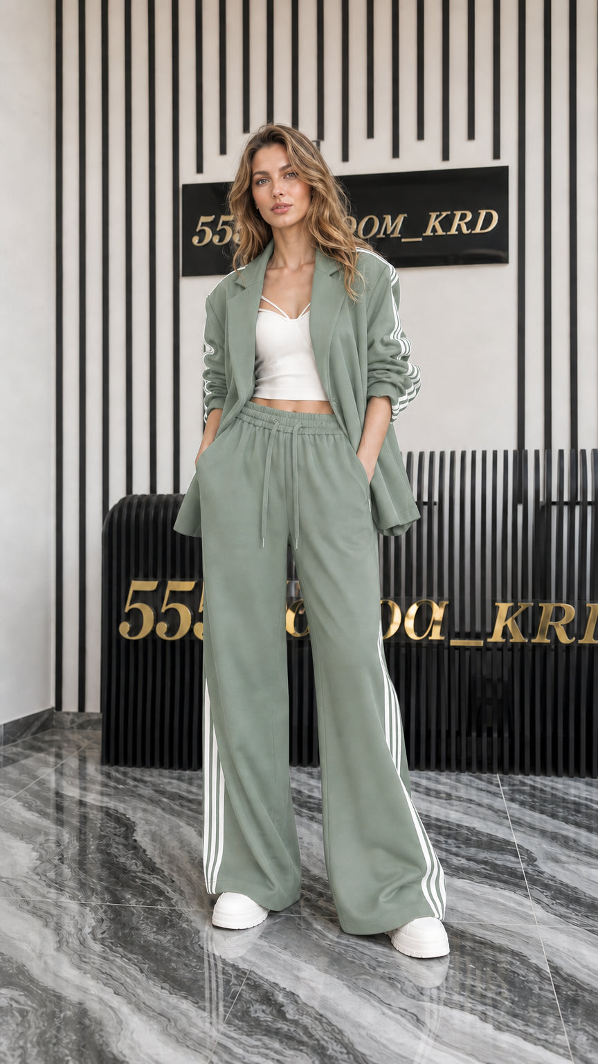 Full front view of women's sage green 2-piece blazer and track pant set