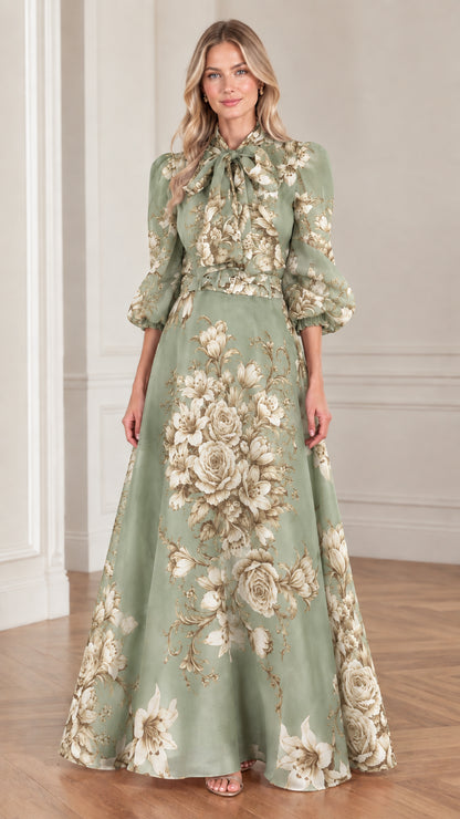 Full front view of sage green floral tie-neck puff sleeve belted maxi dress