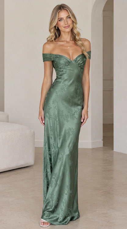 Front view of woman wearing sage green off-the-shoulder satin maxi gown