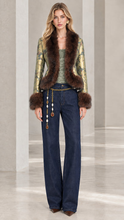 Model wearing sage green floral jacquard jacket with brown faux fur trim