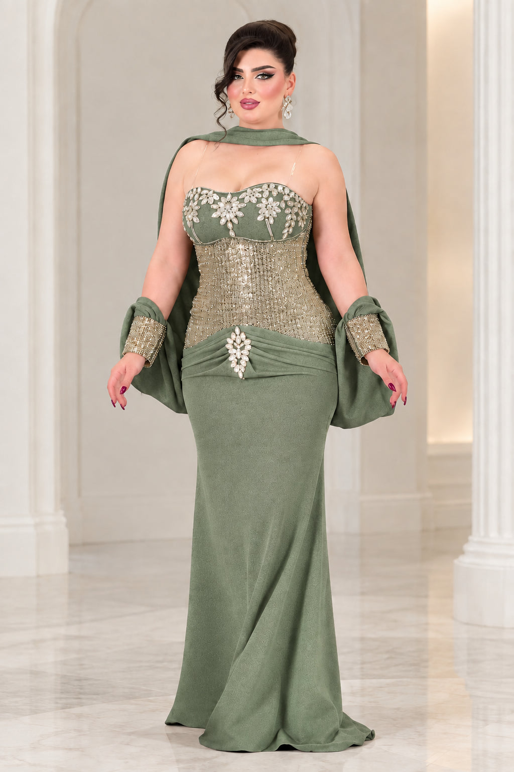 Sage green strapless formal gown with gold sequined bodice and cape