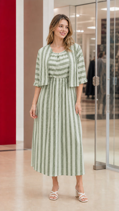 Woman wearing sage green and white striped two-piece dress set