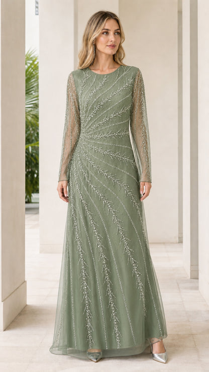 Woman wearing sage green beaded tulle evening maxi dress