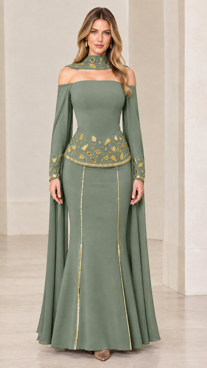 Sage green floor-length evening gown with draped cape sleeves and metallic detailing