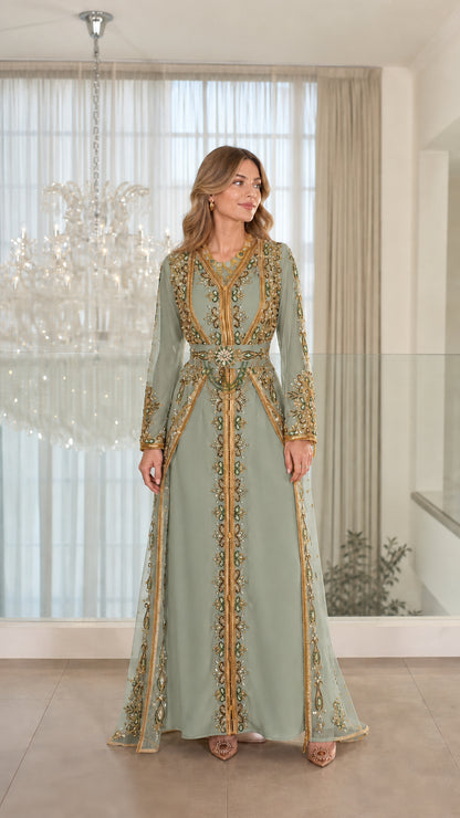 Front view of sage green beaded Moroccan kaftan evening gown with gold trim
