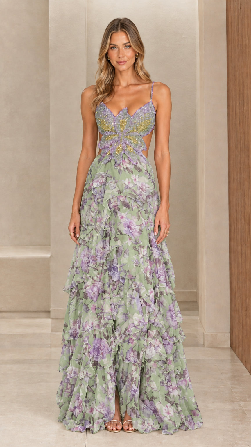 Model wearing sage green floral tiered maxi dress with beaded butterfly detail