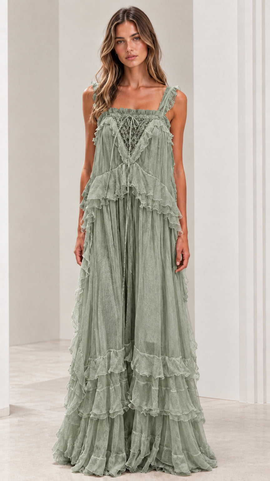 Front view of woman wearing sage green bohemian tiered maxi dress