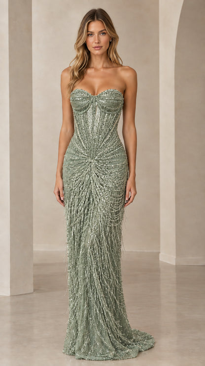 Sage green strapless formal gown featuring radiating bead and fringe details