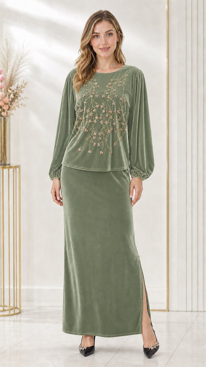 Full-length front view of sage green beaded velvet two-piece maxi skirt set