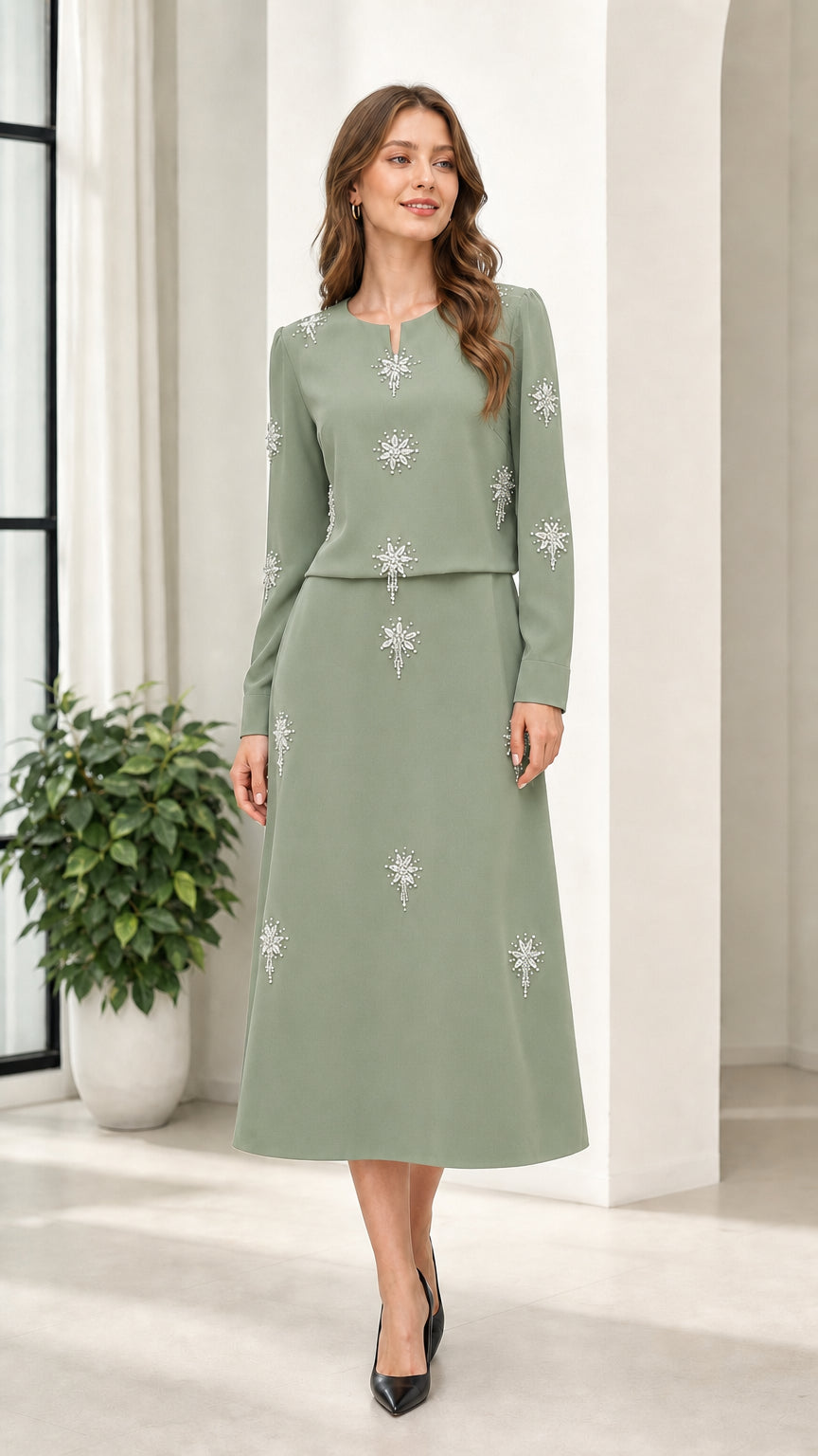 Sage green long sleeve rhinestone embellished midi dress on model