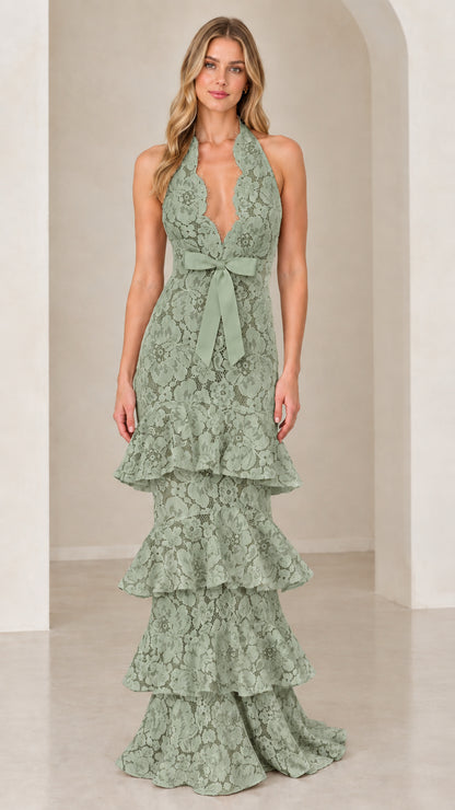Front view of model wearing Sage Green halter tiered floral lace evening dress