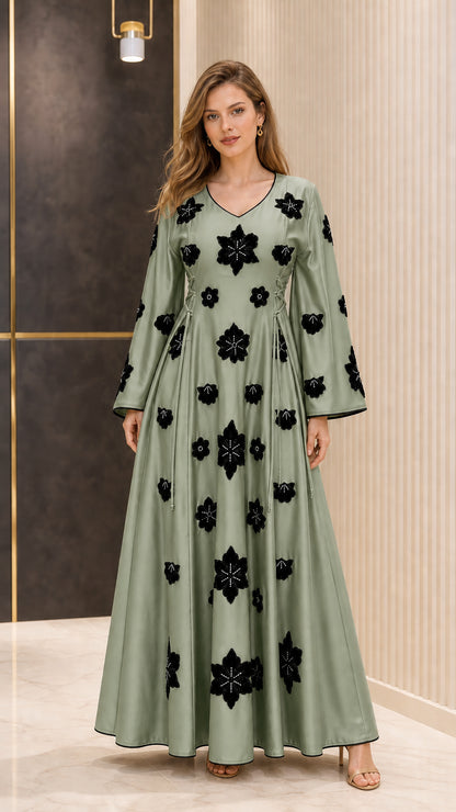 Full-length view of Sage Green satin maxi dress with contrast black floral details
