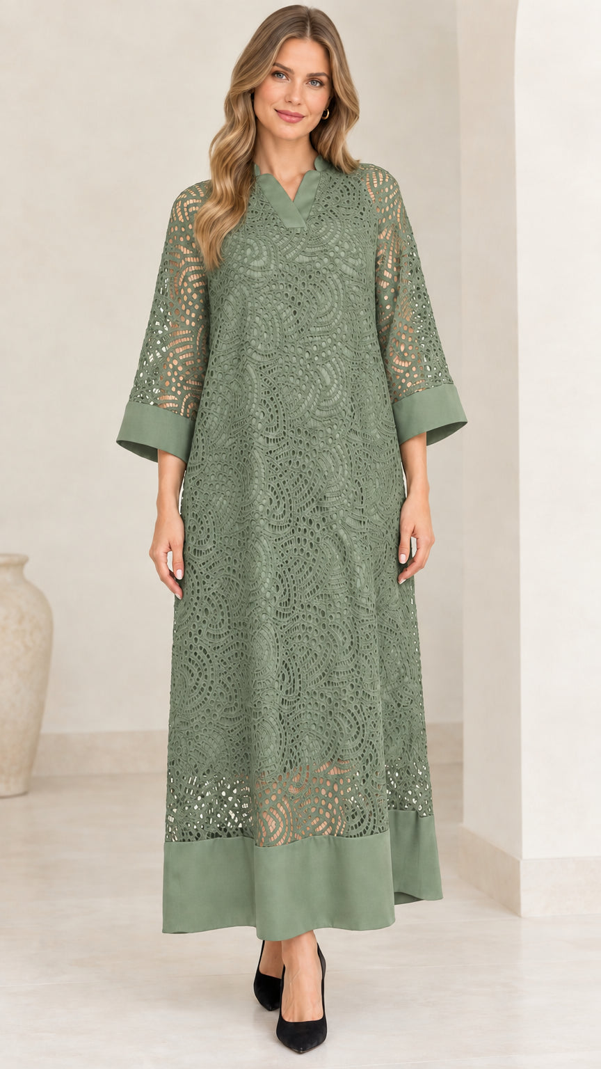 Model wearing sage green lace overlay maxi dress with 3/4 sleeves