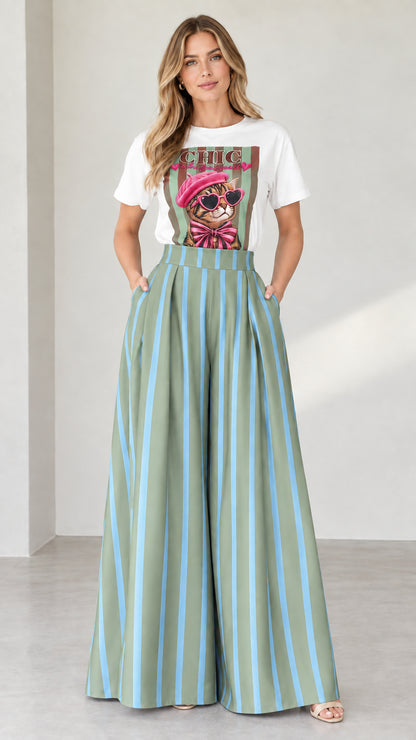 Full-length shot of white graphic tee and sage green striped wide-leg pants set